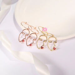 Ruby Stone And Smile Kiss Drop Earrings