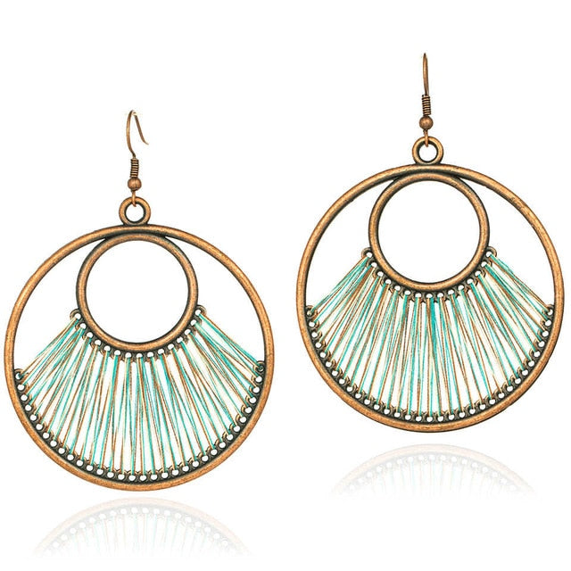 Bohemian Bronze Hoop And Teal Fringe Earrings