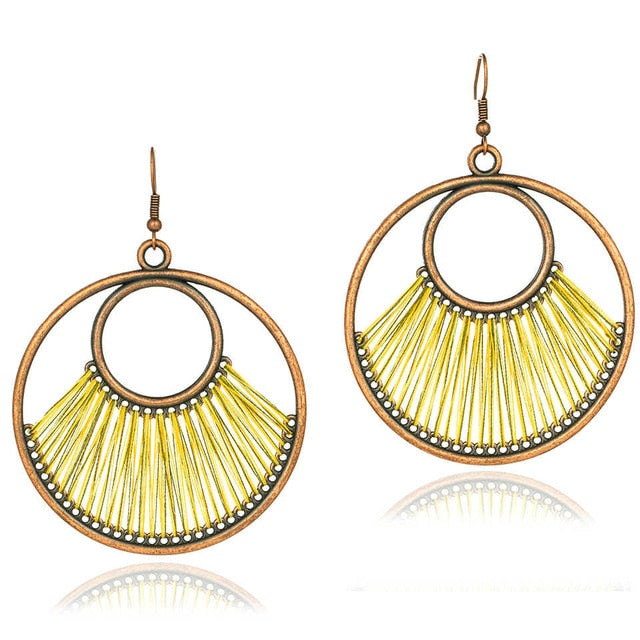 Bohemian Bronze Hoop And Yellow Fringe Earrings