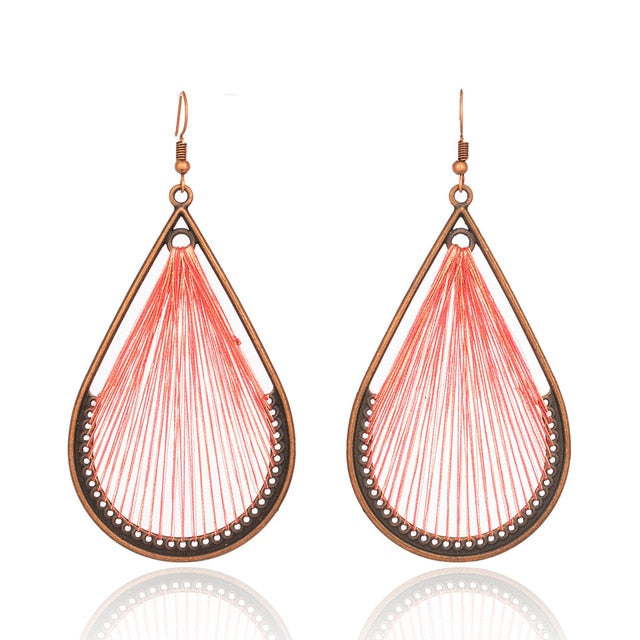 Bohemian Bronze Tear Drop And Red Fringe Earrings