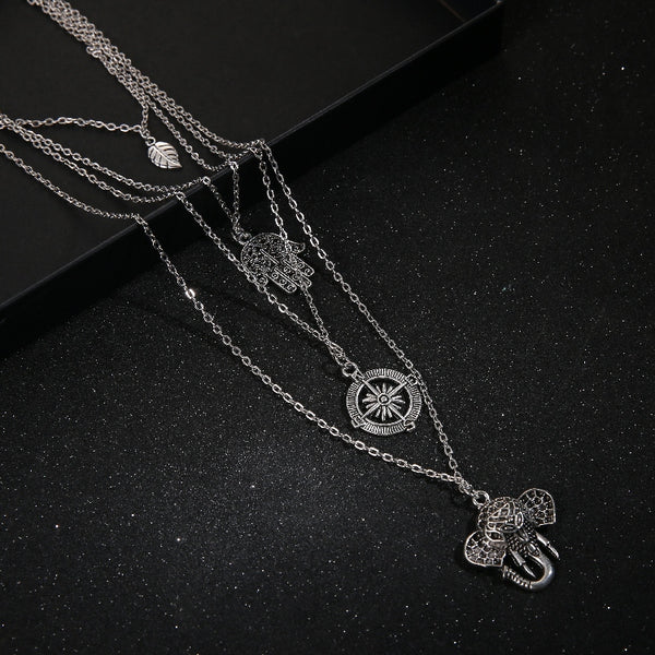 Women's Multi Layer Big Statement Hollow Compass Leaf Elephant Hand Necklace