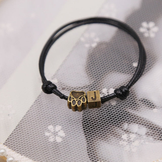 Bronze Puppy Paw And Letter Charm Leather Bracelet