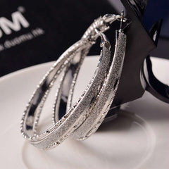 White Rhinestone Encrusted Gold Clasp Hoop Earrings